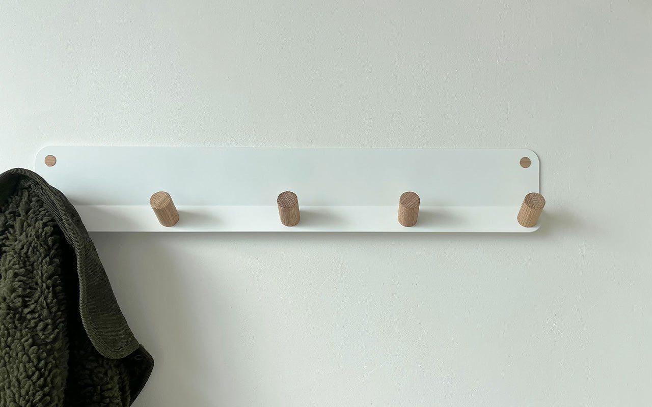 Wall pegs for online hanging